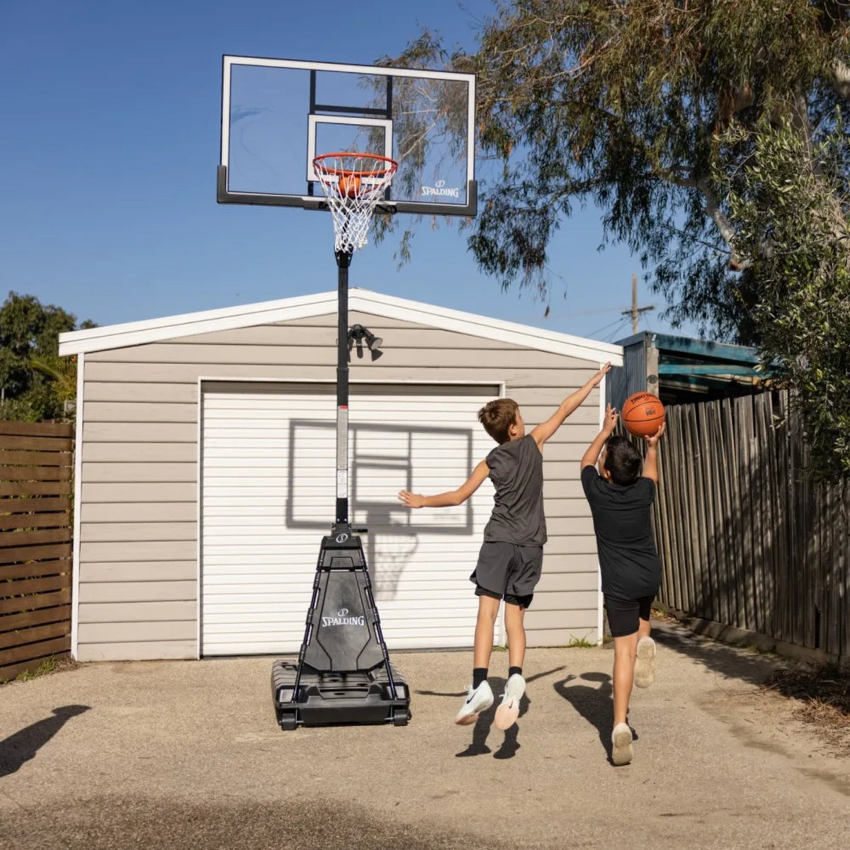 Spalding Momentous EZ Assembly 60 Inch Acrylic Basketball System