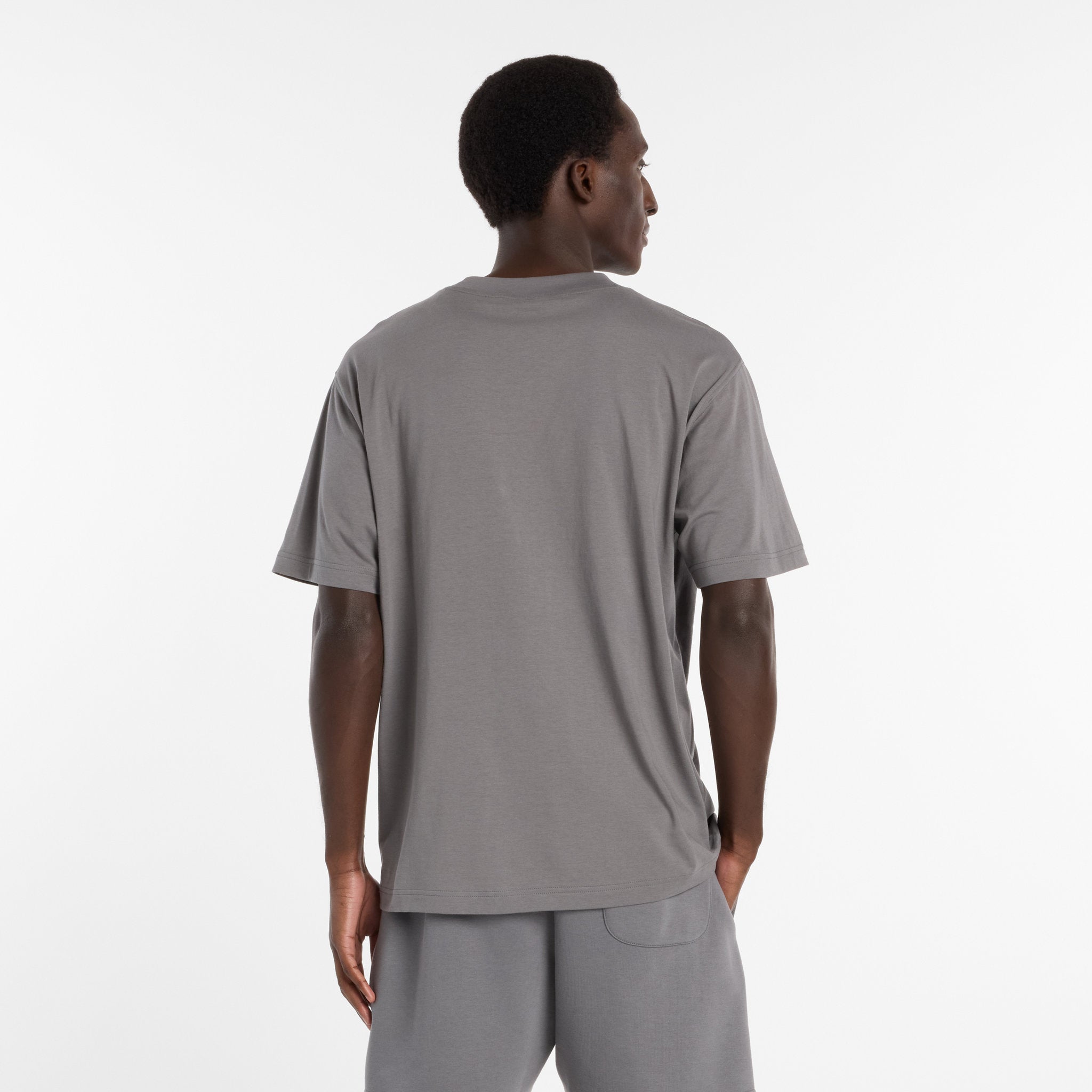 New Balance Reimagined Graphic Mens Tee